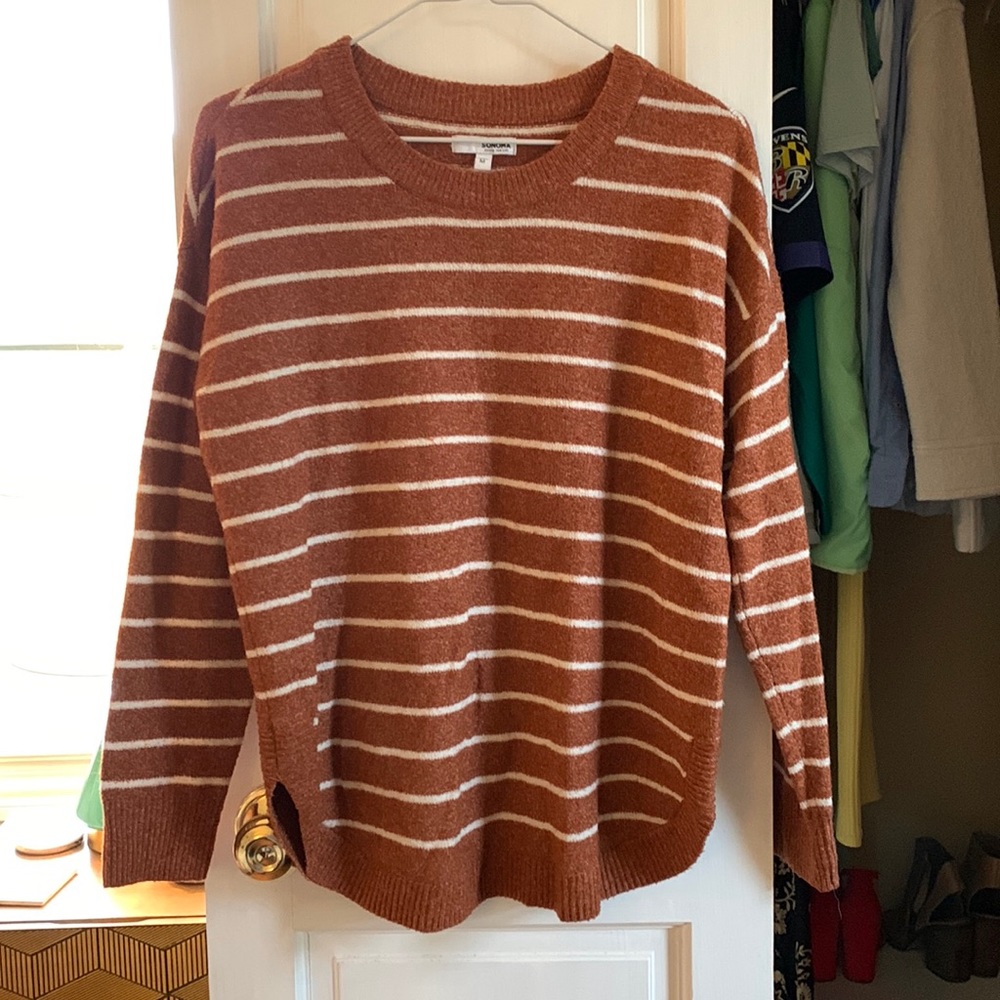 Pumpkin and white striped sweater